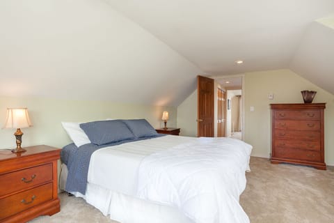 Another view of the upper level primary bedroom