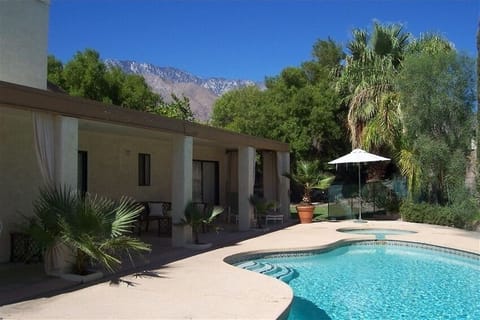 Back of home w pool and spectacular mountain views
