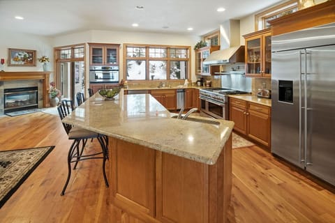 1st floor kitchen - looking at sliding door to back deck (grill/outdoor seating)