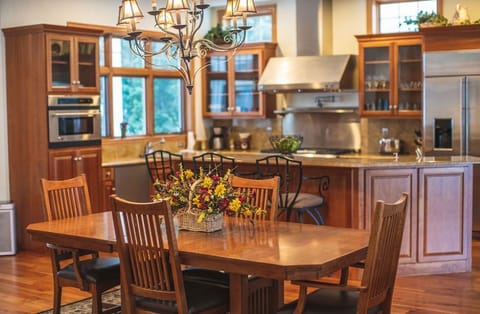 1st floor kitchen and dining area - extra chairs and table extends to sit 8-10