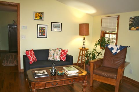 The open living area provides plenty of light and comfortable seating.