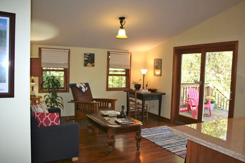 The open living area provides plenty of light and comfortable seating.