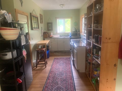 Full kitchen, dw, oven, refrigerator, garbage disposal, dishes, pots, utensils