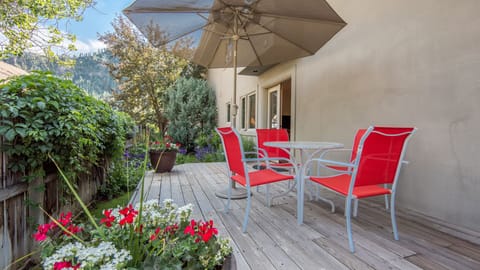 Backyard deck and gardens off of master bedroom.