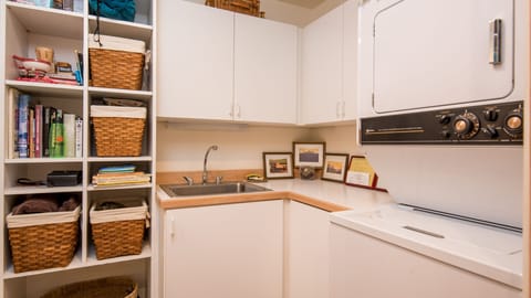  Laundry room with door leading to 1 car garage.