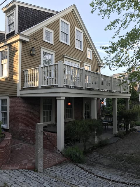 The covered porch and deck at the Adam Macool House