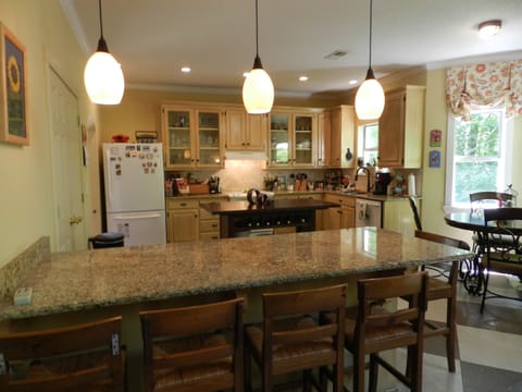 Bar area seating in kitchen.