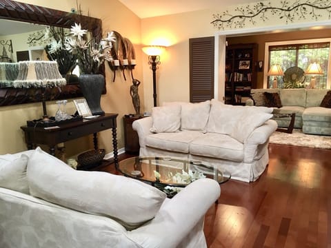 Spacious Living Room with hardwood floors.