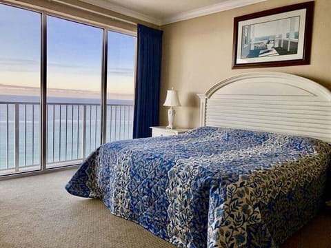 Master Bedroom with a view of the beautiful beach and blue ocean
