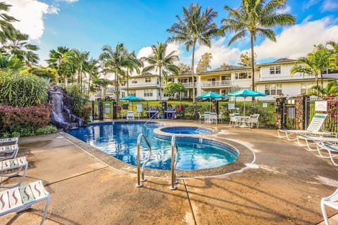 Pool with waterfall feature , Spa and 2 BBQS