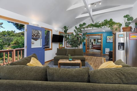 View from living room looking into bedroom.