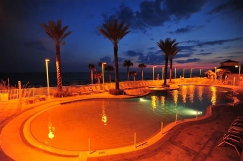 Pool area has two hot tubs and separate kiddie pool playground.