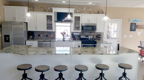 New kitchen - appliances, TV & granite counters - seating 6.  