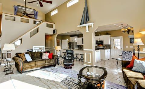View of our kitchen, stairs to the loft & the hallway to the third bedroom