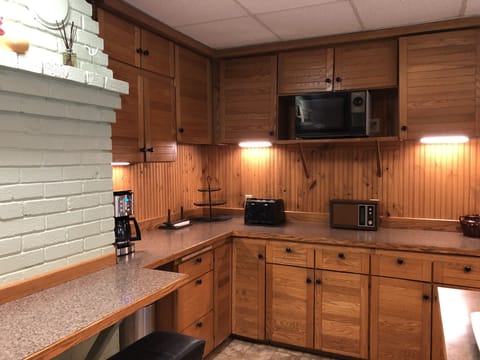 Plenty of well-stocked cupboards; dishes, cookware, serving pieces for a crowd