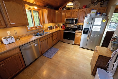 new kitchen appliances srping 2024.  Over range microwave, glass cooktop, fridge