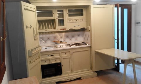 Self contained kitchen credenza in second apartment