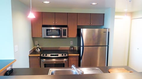 Fully equipped kitchen with stainless steel appliances