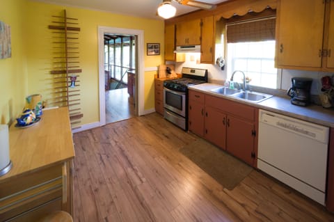 Lodge kitchen, fully stocked with gas stove, microwave, dishwasher.