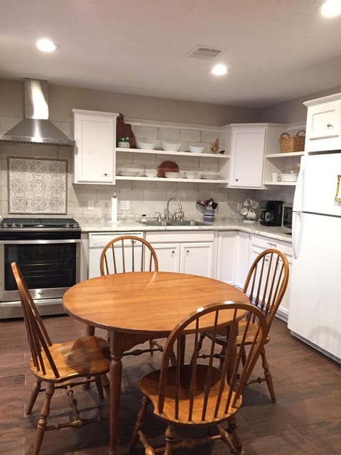 Lovely everything-new kitchen.  Two leaves available for table.