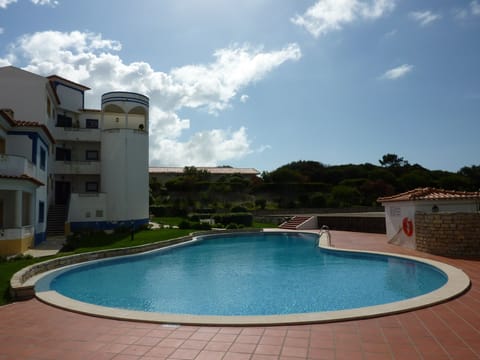 Pool adjacent to apartment