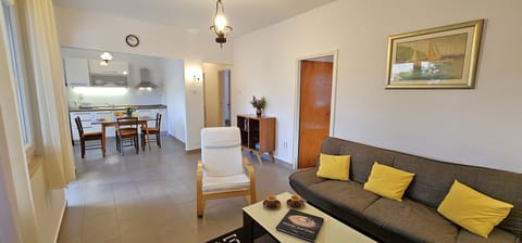 Open plan living room with dining room and kitchen