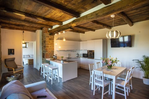 spacious and bright living space with french doors directly leading outside 