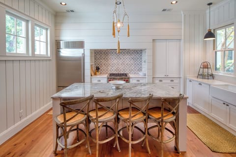 Kitchen area with bar stools