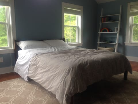 Upstairs bedroom with a queen bed and amazing light. 