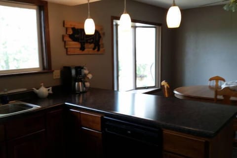 Newly remolded kitchen with a dining room table for 6.