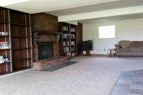 Cozy basement with 2 comfy couches. Fireplace not available for guest use.