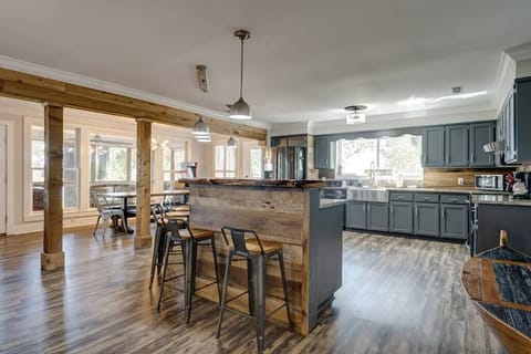 The open floor plan kitchen has room to entertain your entire group!