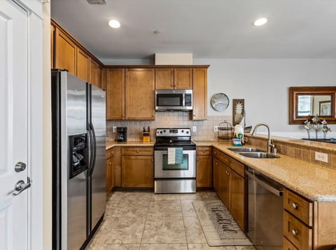 Fully equipped kitchen with stainless steel appliances