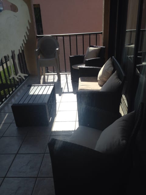 Large corner balcony poolside 