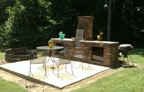 backyard grilling area with fire pit