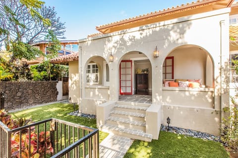 Experience timeless charm in this Spanish Colonial Revival gem, a historic 1926 Diamond Head cottage beautifully restored with modern luxuries.