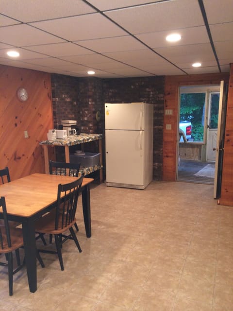 reverse angle of kitchen and screened porch