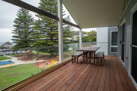 Private balcony and panoramic views of Macmasters Beach.