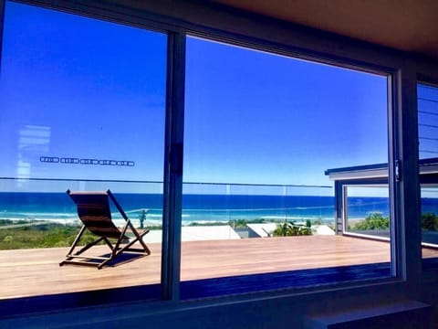 Watch the whales cruising by ! Enjoy cocktails taking in spectacular views !