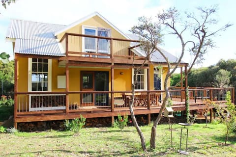 Side aspect of the house with balcony off the main bedroom