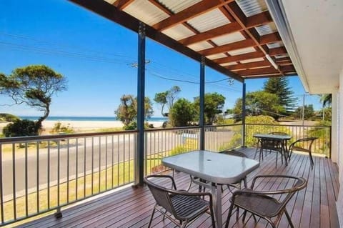 Balcony overlooking lake and ocean