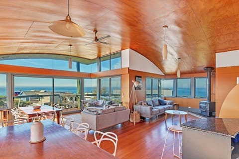 Main living space. Two large dining tables. Air-conditioning and heating.
