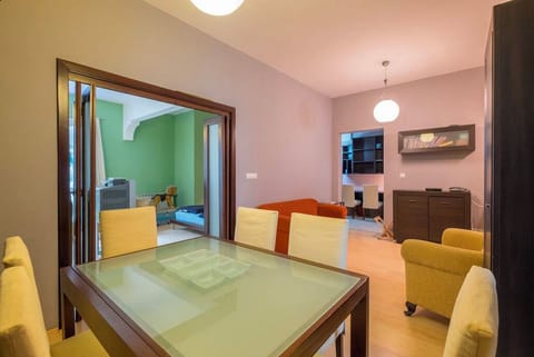 Dining Area / Living Room and Entrance to Master Bedroom.