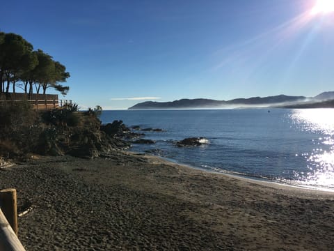 La Farella Beach looking towards El Port de la Selva and Cap de Creu