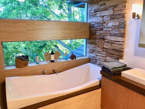The Tree Top view bath is a guest favourite, and it's big enough for two!