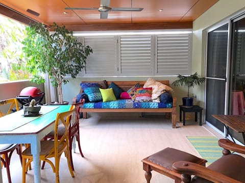 The large covered balcony is a great place to eat, relax, have a nap!