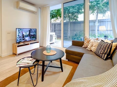 Living Room with Comfy Sofa Seats and Smart TV