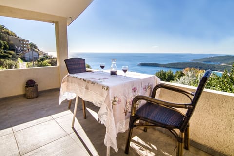 Enjoy the beautiful views from your private furnished balcony.