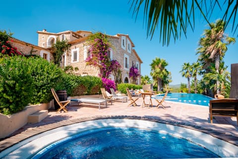 Jacuzzi and infinity pool lounging with superb view
