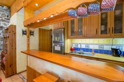 Look into kitchen from breakfast bar.